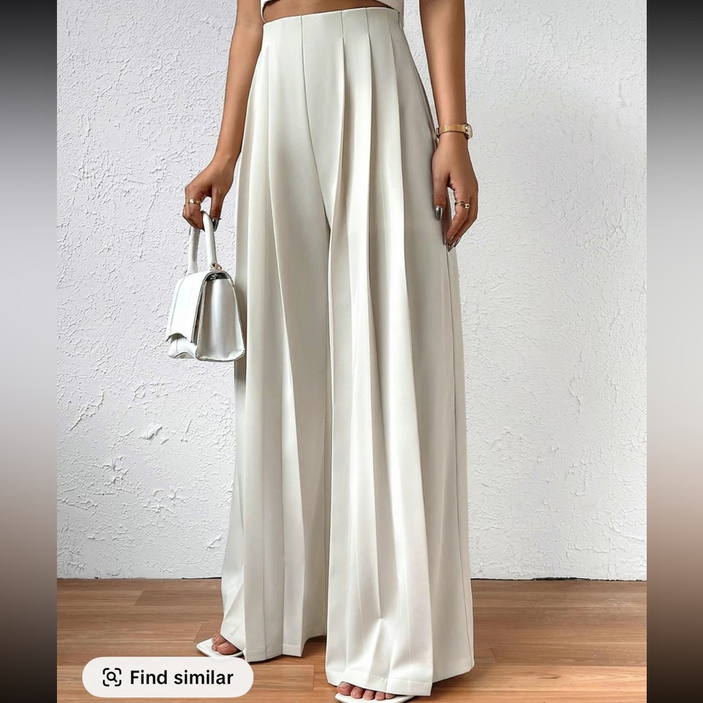 Pleated white wide leg pants